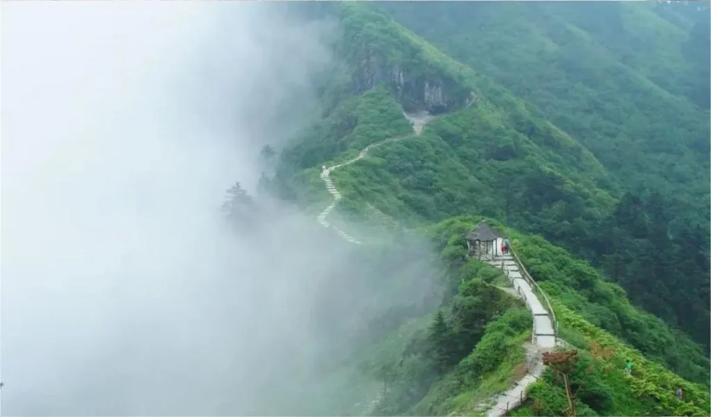 Yin-Yang Boundary at Xiling Snow Mountain, showing contrasting weather phenomena