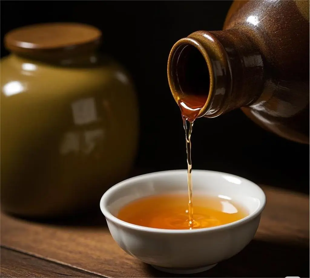 Shanghai drinks: Traditional Yellow Wine (Huángjiǔ) in a porcelain cup, a mellow Jiangnan specialty.