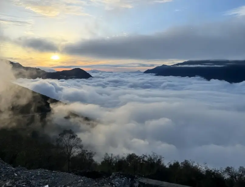 Sea of clouds rolling across Mount Zhaogong as seen from the Cloud-Sea Viewing Deck.
