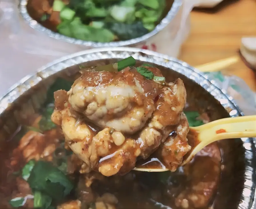 Spicy roasted pig brains at Jianshe Road Night Market, adventurous Chengdu snack