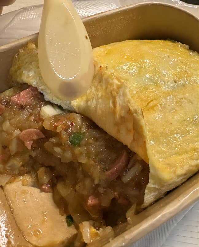 Danbao yangyu egg-wrapped potato street food at Fuqin Night Market in Chengdu