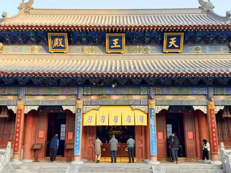 Heavenly Kings Hall at Daxingshan Temple in Xi’an, guarding the sacred Buddhist grounds with traditional statues