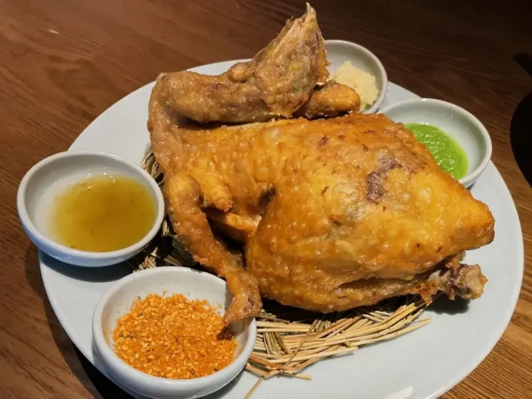 Close-up of Xi’an Hulu Chicken highlighting the crispy skin and tender meat