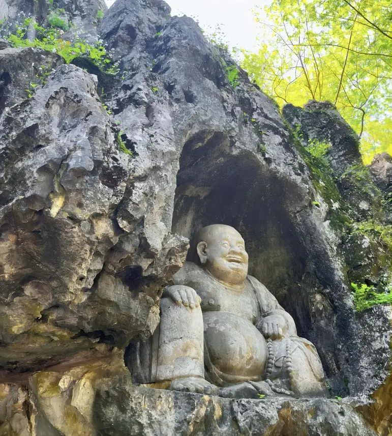 The Laughing Buddha rock carving at Feilai Feng near Lingyin Temple in Hangzhou