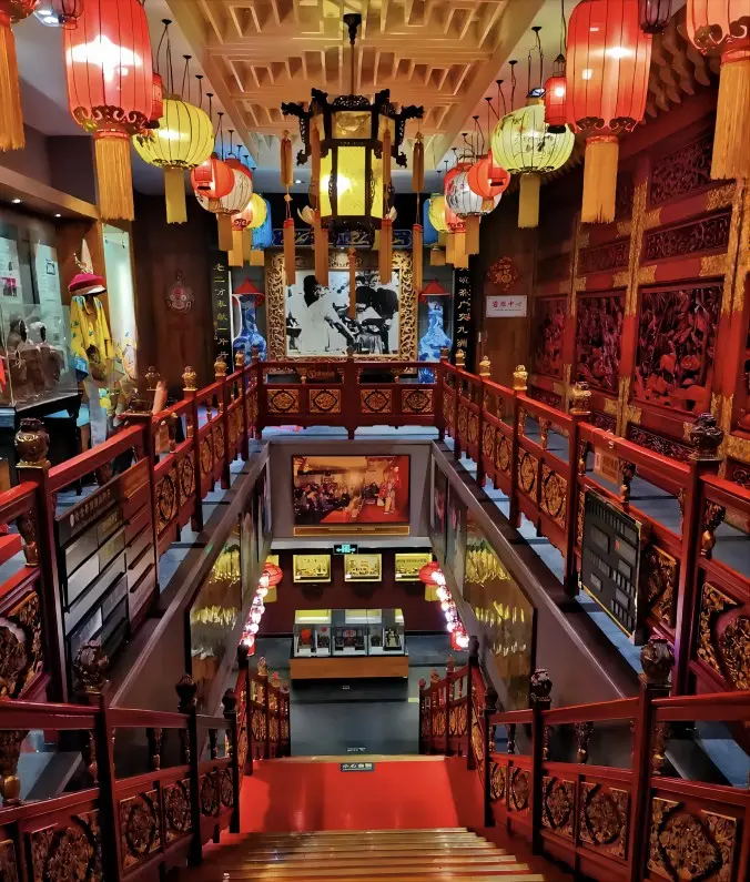 Interior view of Lao She Teahouse in Beijing, showing traditional Chinese decor