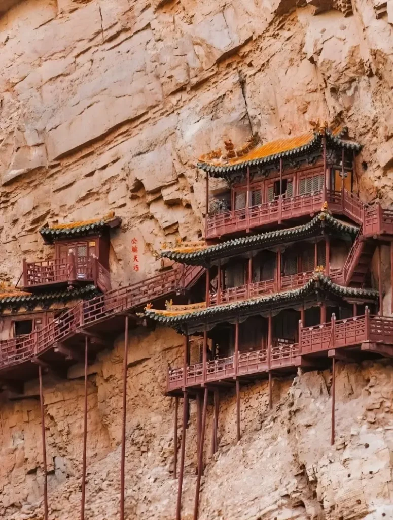 Panoramic view of the Hanging Temple perched on a cliff in Datong, one of the most iconic architectural wonders in China.