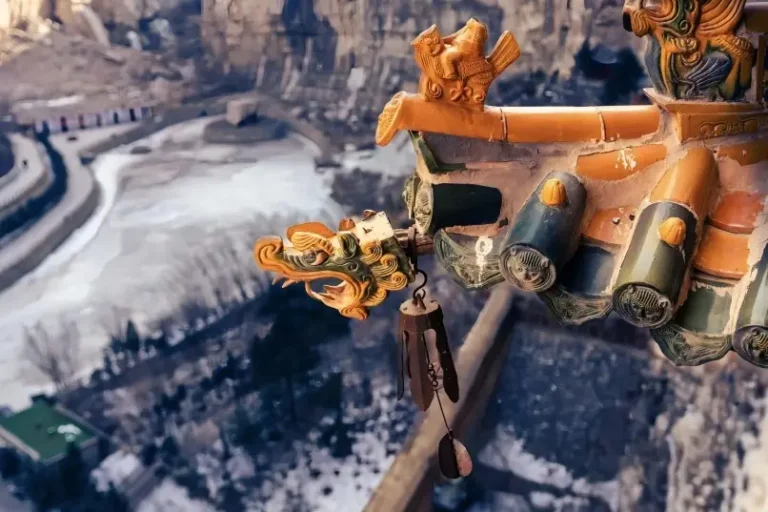 Close-up shot of the roof corner of the Hanging Temple, highlighting the unique and precarious architectural structure.