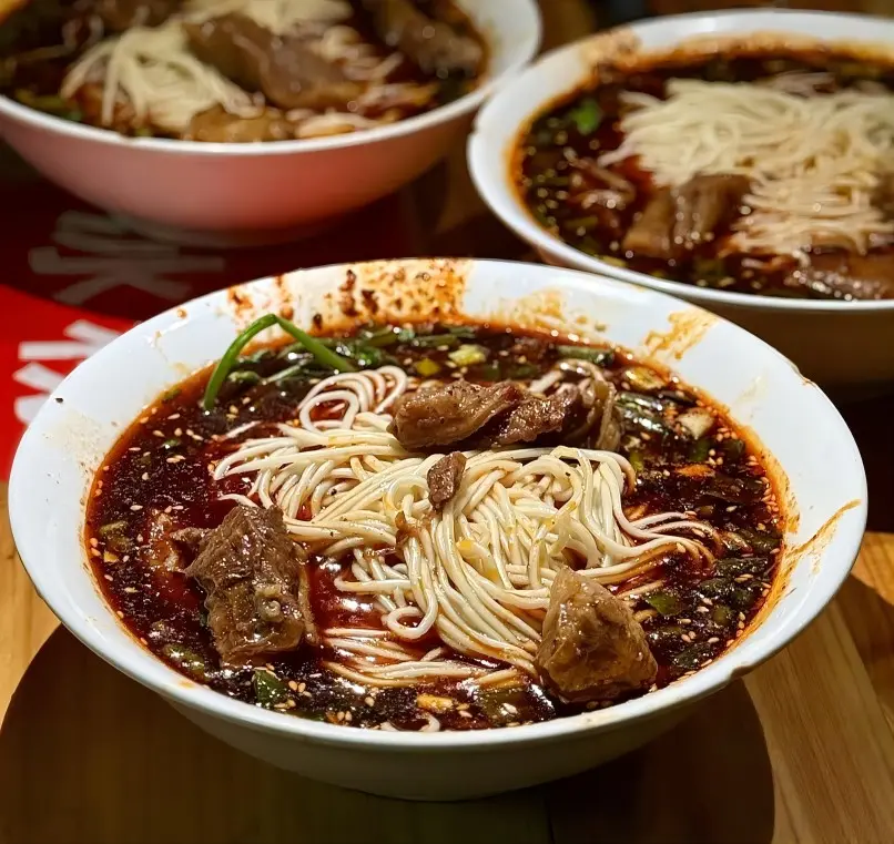 Chongqing noodles (xiaomian) with spicy seasoning and toppings