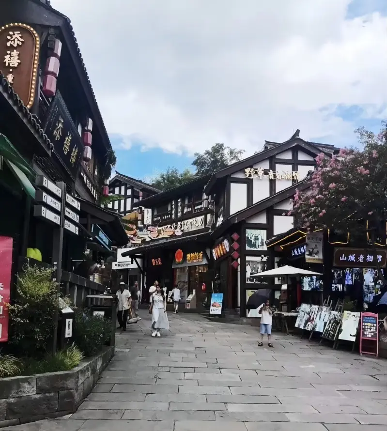 Traditional street scene in Ciqikou Ancient Town with shops and local snacks