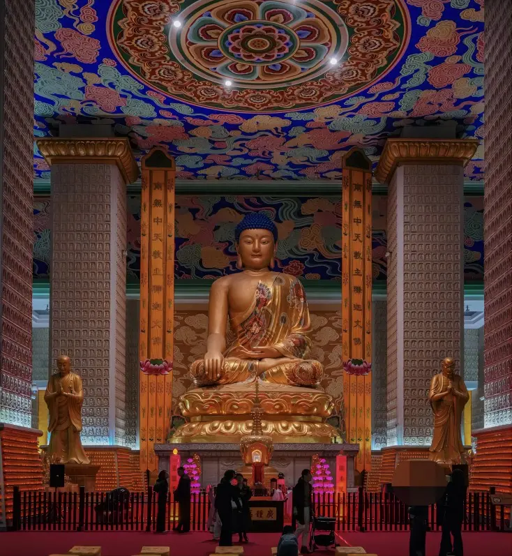 Golden Bodhisattva statue inside the Mahavira Hall at Famen Temple