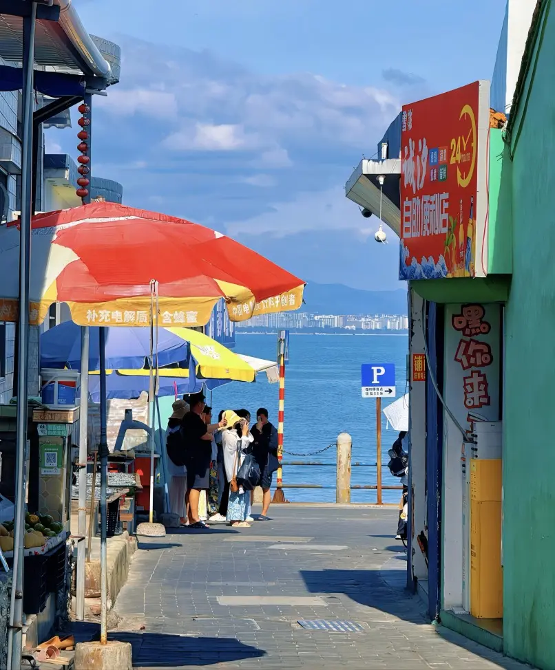 Cultural scenery on West Island (Xidao), Sanya, showing local village life and nature