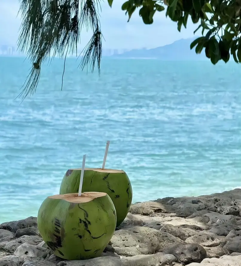 Sea view of West Island (Xidao), Sanya, with clear blue waters and horizon