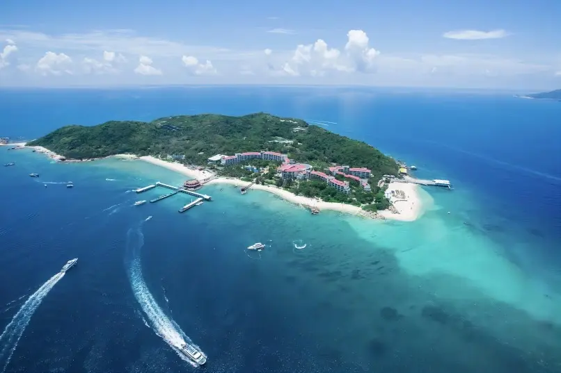 Aerial view of Wuzhizhou Island, Sanya, showing turquoise waters and tropical coastline