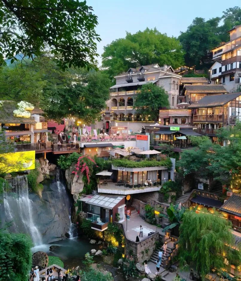 Xihaoli waterfall viewpoint with layered urban scenery in Chongqing mountain city