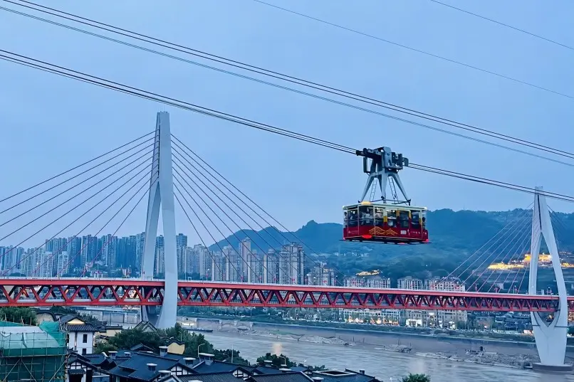 Yangtze River Cableway crossing the river with Chongqing skyline in background