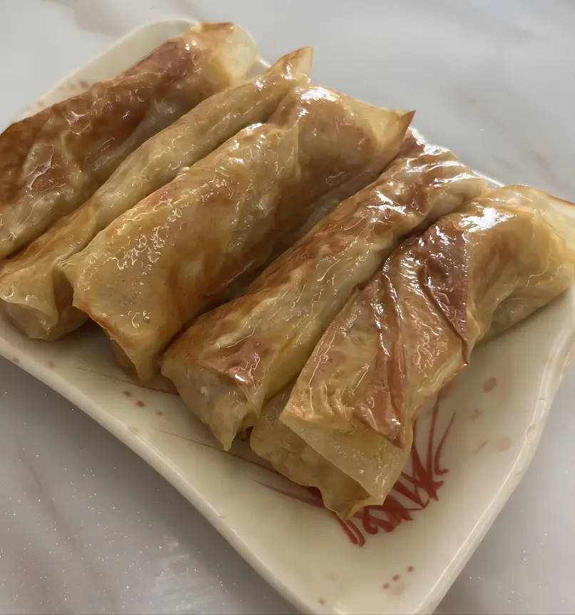 Yiwu Chigan Tofu Skin Vegetarian Dumplings, a healthy, vegetarian dish wrapped with mushrooms and tofu.