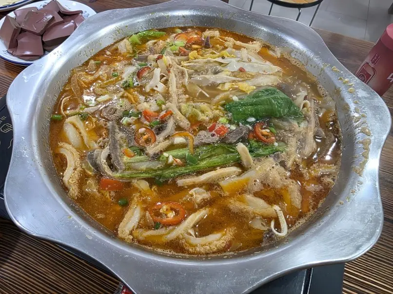 Yiwu Shangxi Beef Offal Hotpot, a flavorful and tender hotpot dish made with beef tripe and spices.