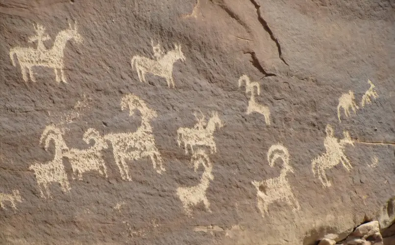Rock painting depicting a herd of sheep at Helan Mountain, one of the many prehistoric scenes carved into the rocks.