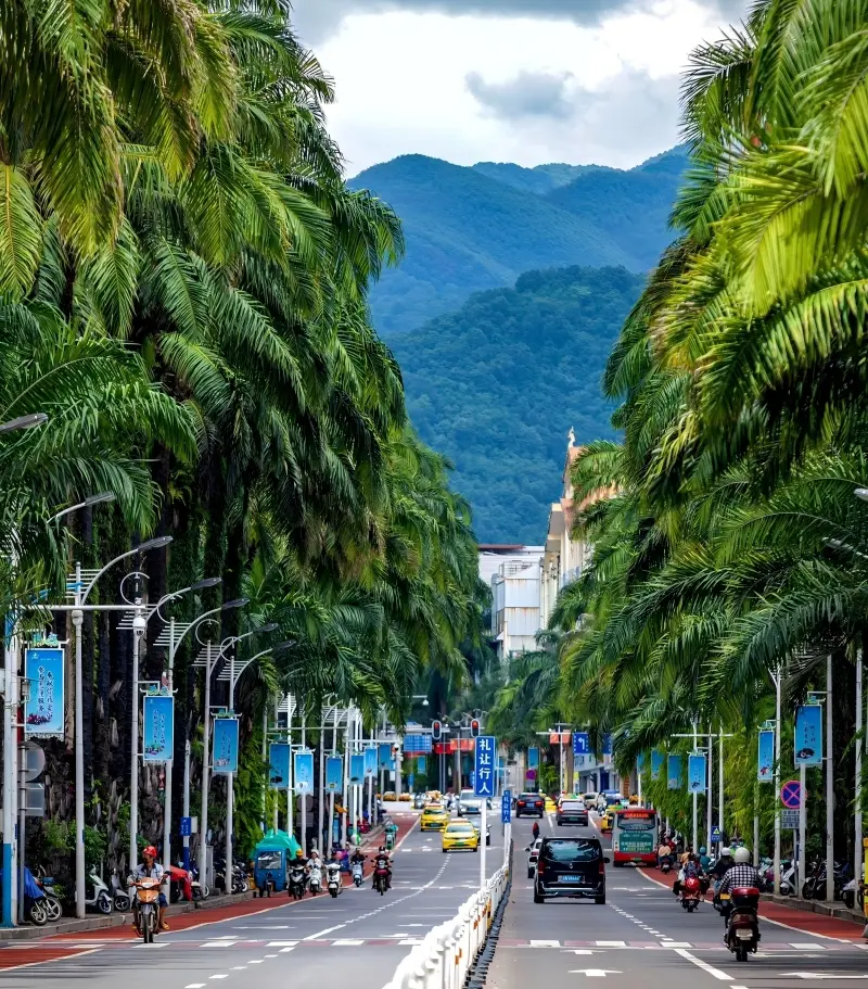 Street view of Mangshi city with tropical atmosphere and local daily life.