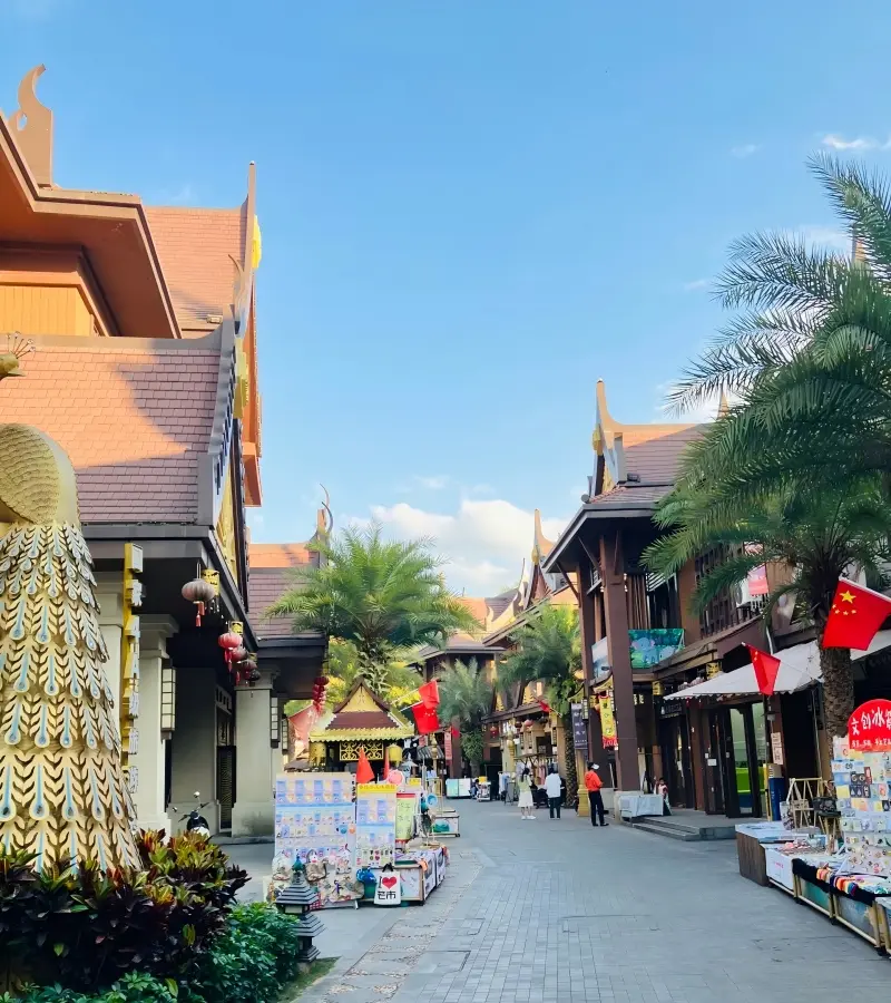 Scenic view inside Dai Ancient Town in Mangshi with traditional architecture and streets.