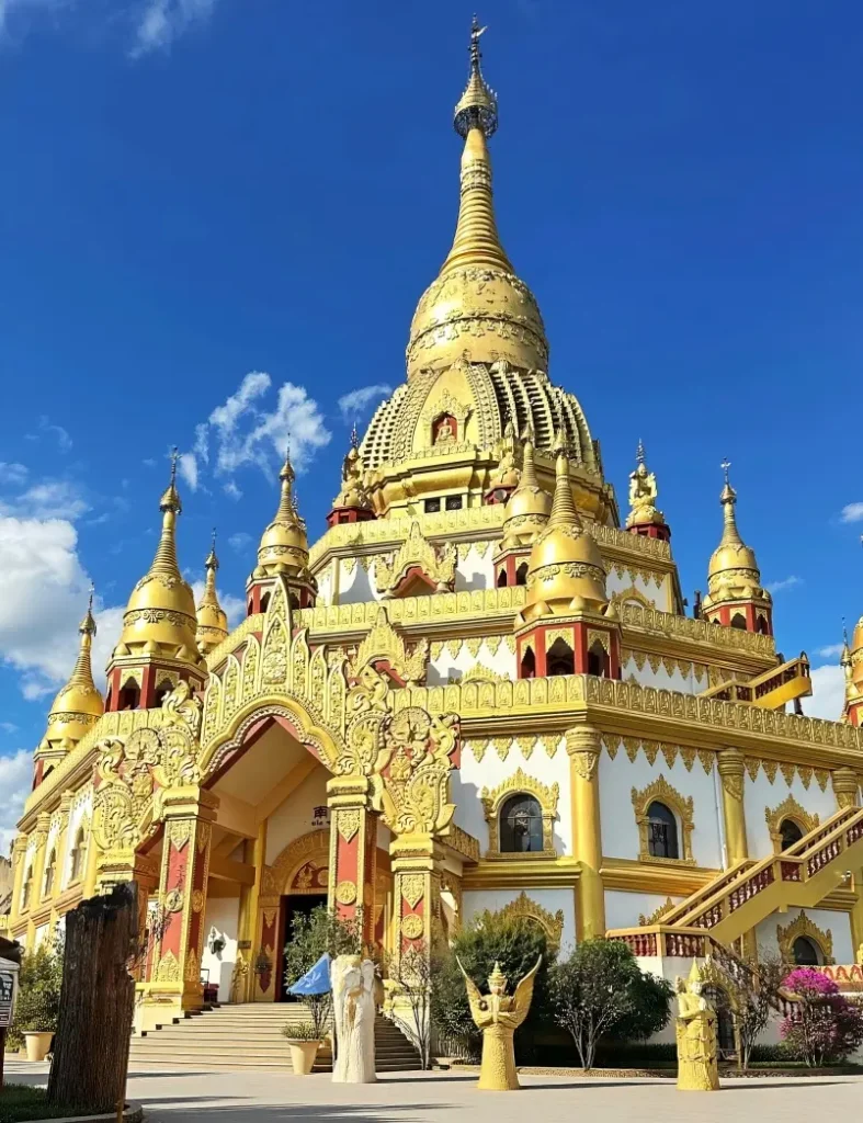 Panoramic view of Menghuan Golden Pagoda in Mangshi, the city's most famous Buddhist landmark.