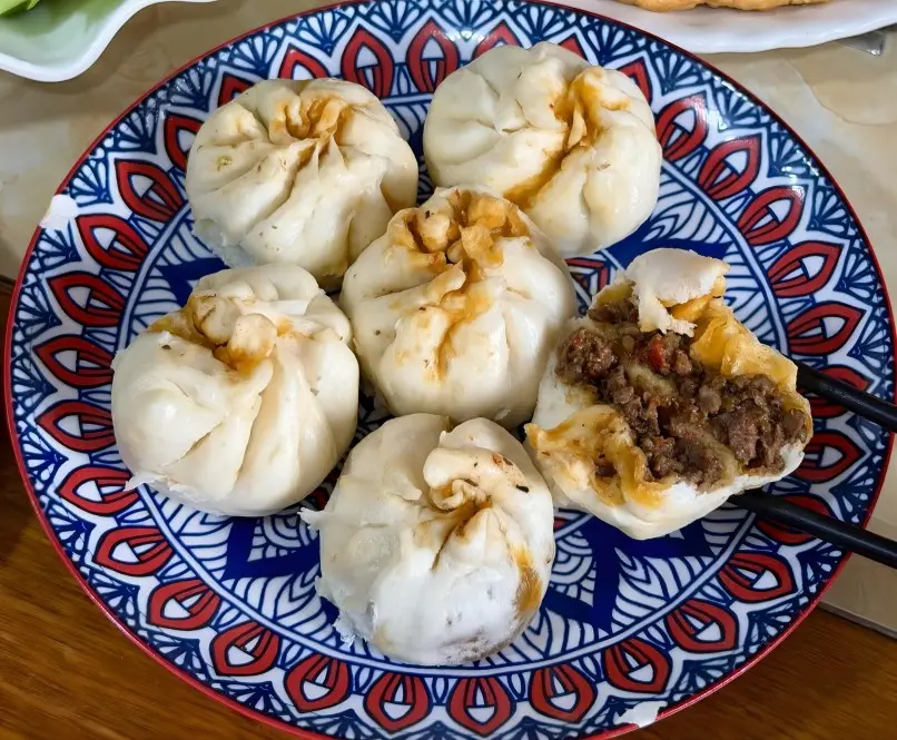 Tibetan yak meat dumplings, a savory local snack filled with yak meat and onions.