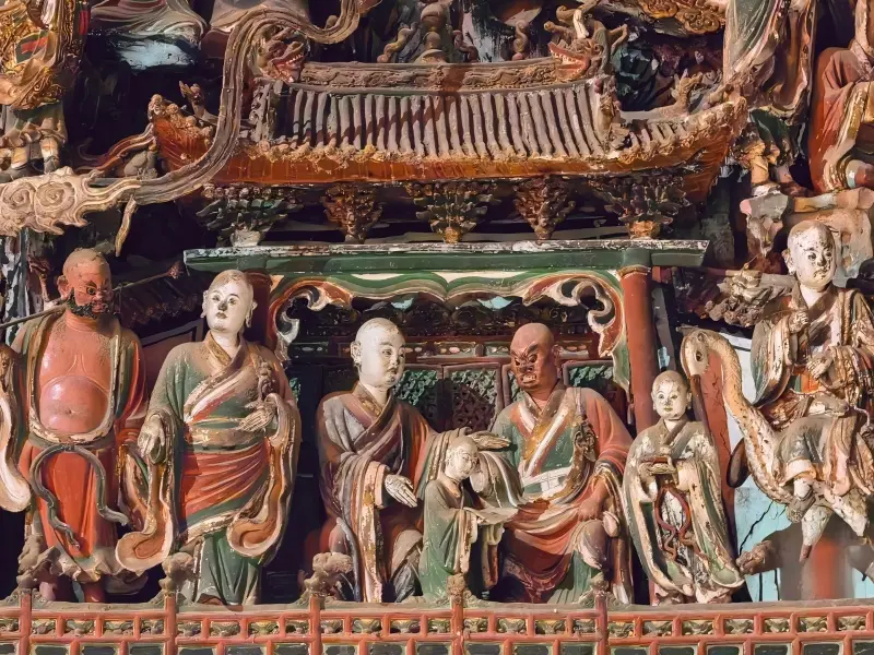 Close-up of Ming Dynasty painted clay sculptures inside Shuilu’an Temple