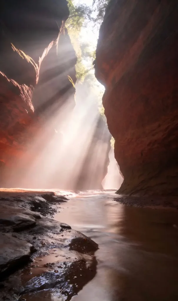 Sunlight shining into the narrow canyon of Yucha Grand Canyon