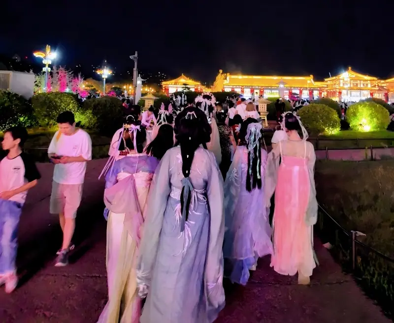 Tourists in Hanfu walking on a street in Xi’an