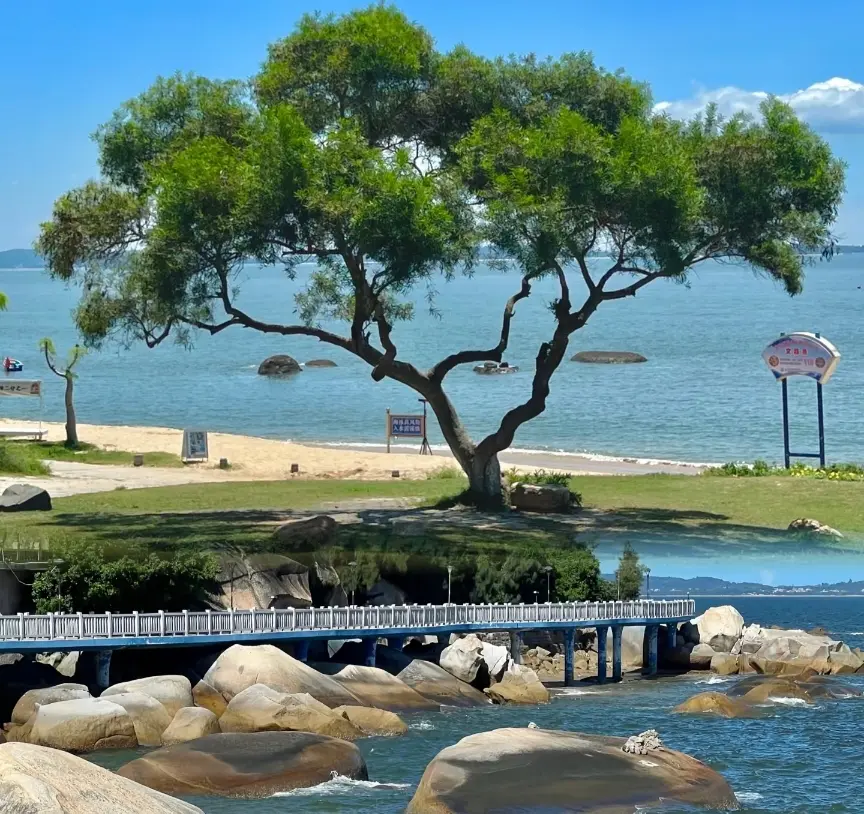 Coastal sea view of Xiamen, China, with blue water and a scenic shoreline