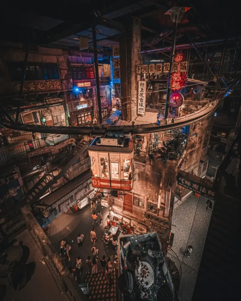 Aerial view of Super Wenheyou in Changsha, with its nostalgic old-city setting illuminated at night.
