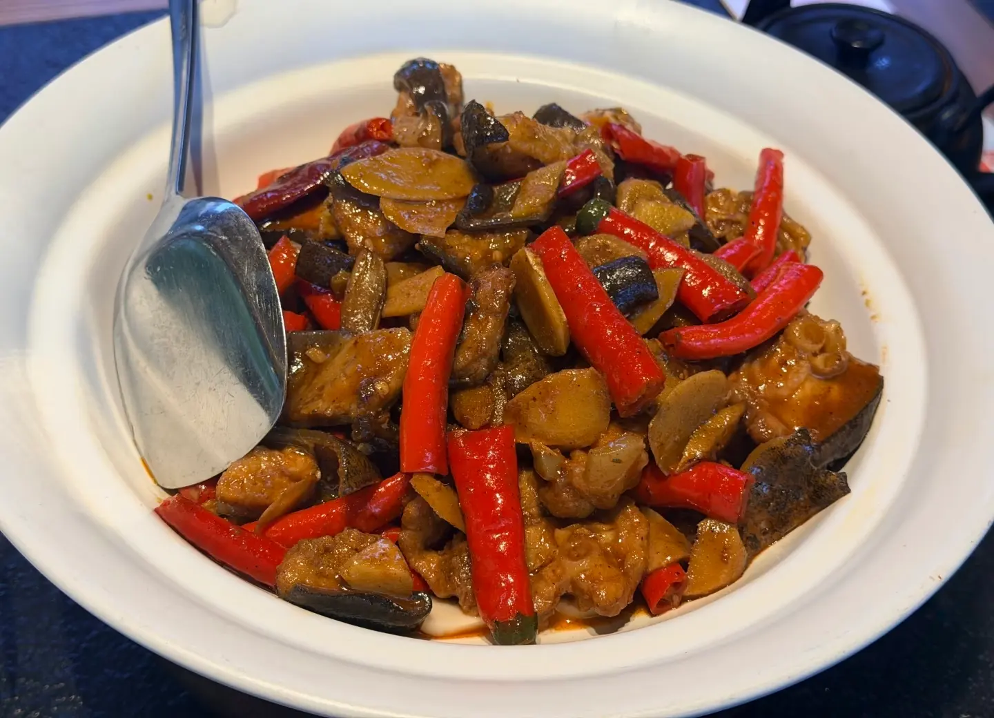 Close-up of a braised giant salamander dish, a highly nutritious local specialty in Zhangjiajie.