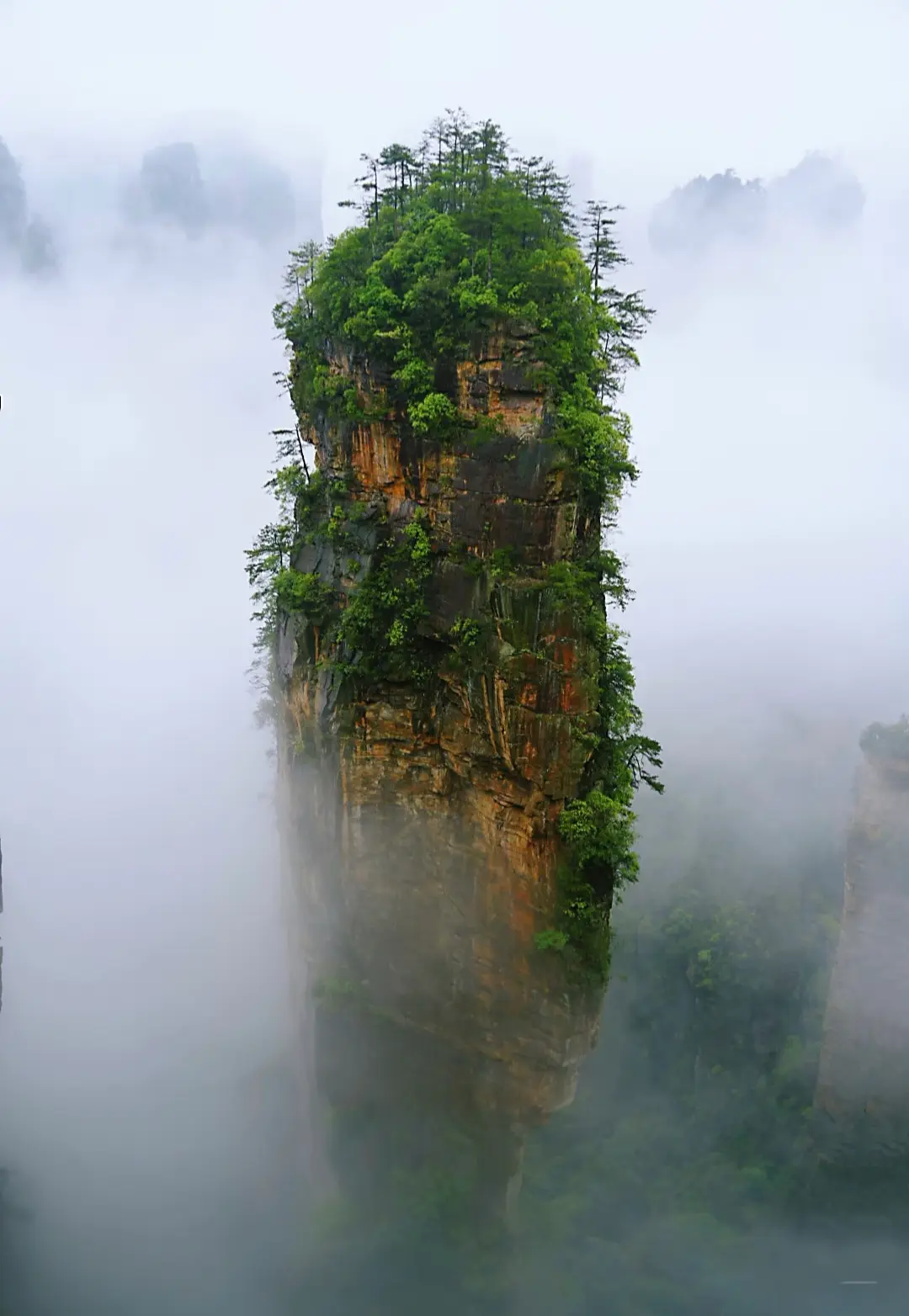 The misty and foggy Qiankun Column, also known as the Avatar Hallelujah Mountain, in Zhangjiajie National Forest Park.
