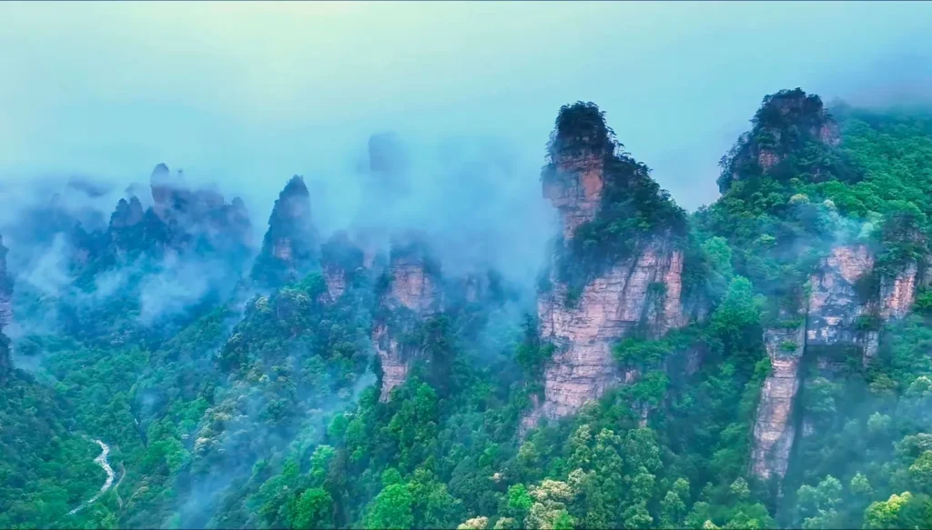 Dramatic sandstone peak formations lining both sides of the Ten-Mile Gallery in Suoxiyu